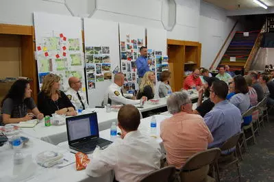 Craig Lewis, Stantec, reviews the weeks ideas with the Steering Committee.