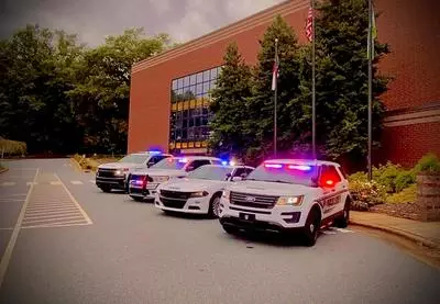 Morganton Public Safety vehicles parked in front of CoMMA