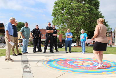 A group learns about the mandala