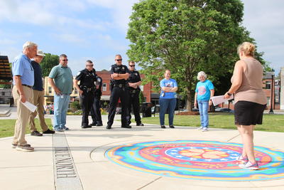 A group visits the mandala exhibit