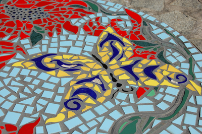Butterfly mosaic on ground